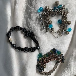 3 multicolored bracelets